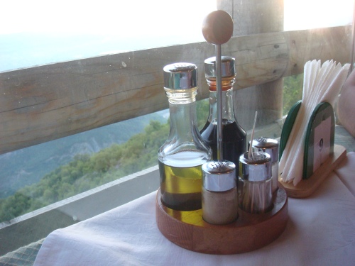 Oil and vinegar are all you need to make a simple and healthy salad dressing.  If you can eat that salad while sitting on a balcony overlooking a scenic valley, even better.  (Source: hitham alfalah, Creative Commons)